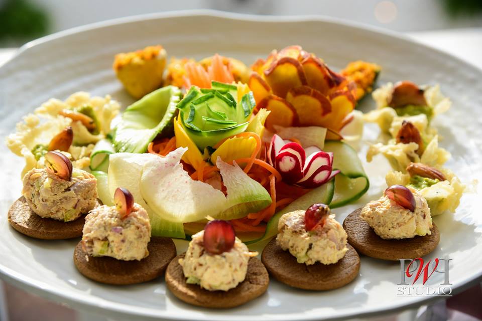 Artisan appetizer plate with vegetable garnish