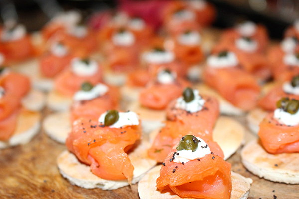 Smoked salmon canapés with cream cheese and capers