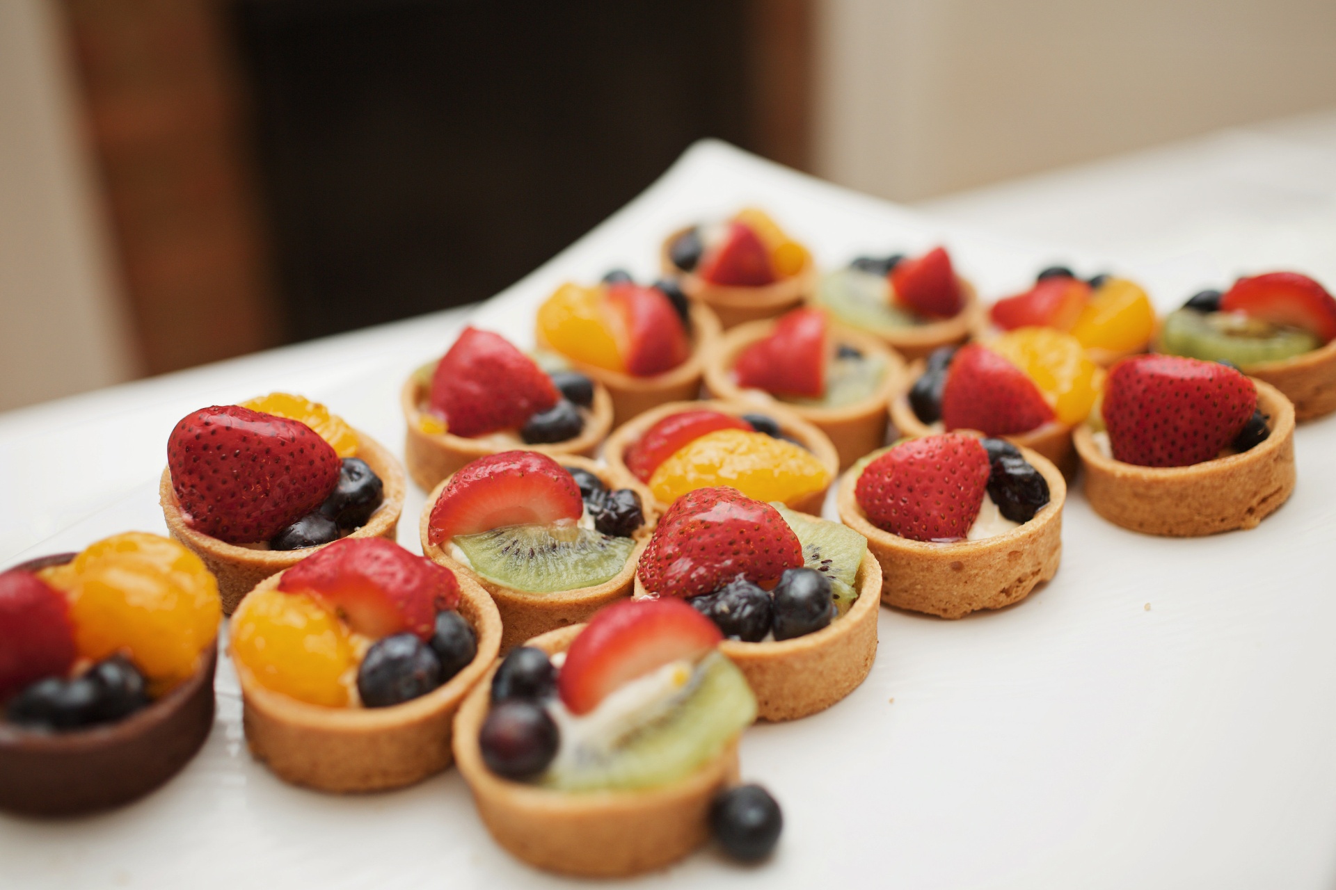 Elegant fruit tarts with fresh berries